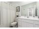 White bathroom with toilet and single vanity at 3244 W Cedar Ridge Rd, Phoenix, AZ 85083