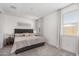 Well-lit bedroom with king-size bed and ensuite bathroom at 3244 W Cedar Ridge Rd, Phoenix, AZ 85083