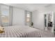 Spacious bedroom with king-size bed and access to patio at 3244 W Cedar Ridge Rd, Phoenix, AZ 85083