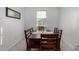 Charming dining room featuring a wood table and six chairs at 3244 W Cedar Ridge Rd, Phoenix, AZ 85083