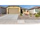 New single-story home with a two-car garage and desert landscaping at 3244 W Cedar Ridge Rd, Phoenix, AZ 85083
