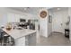 Modern kitchen with stainless steel appliances and island at 3244 W Cedar Ridge Rd, Phoenix, AZ 85083