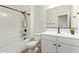 Clean bathroom with white vanity, bathtub, and modern fixtures at 35321 W Santa Monica Ave, Maricopa, AZ 85138
