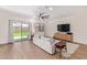 Spacious living room with sliding glass doors leading to backyard at 35321 W Santa Monica Ave, Maricopa, AZ 85138