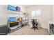Home office featuring shelving unit and comfortable desk chair at 35321 W Santa Monica Ave, Maricopa, AZ 85138