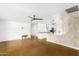 Bright living room with modern kitchen and polished concrete floors at 3634 E Piccadilly Rd, Phoenix, AZ 85018