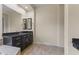 Elegant bathroom with dark wood cabinets and granite countertops at 36549 N Porta Nuova Rd, Scottsdale, AZ 85262