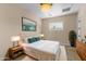 Bedroom with plush bed, elegant decor, and soft rug at 36549 N Porta Nuova Rd, Scottsdale, AZ 85262