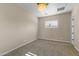 Well-lit bedroom with carpeted floor and window shutters at 36549 N Porta Nuova Rd, Scottsdale, AZ 85262