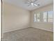 Well-lit bedroom with neutral walls and carpeted floor at 36549 N Porta Nuova Rd, Scottsdale, AZ 85262