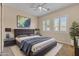 Bright bedroom featuring a comfortable bed and stylish decor at 36549 N Porta Nuova Rd, Scottsdale, AZ 85262