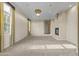 Primary bedroom with fireplace and large windows offering scenic views at 36549 N Porta Nuova Rd, Scottsdale, AZ 85262