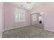 Bright bedroom with mirrored closet doors and a chandelier at 36549 N Porta Nuova Rd, Scottsdale, AZ 85262
