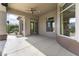 Covered patio with access to backyard and a ceiling fan at 36549 N Porta Nuova Rd, Scottsdale, AZ 85262