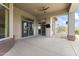 Covered patio with ceiling fan and access to the backyard at 36549 N Porta Nuova Rd, Scottsdale, AZ 85262