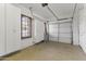 Garage with storage cabinets and epoxy floor at 36549 N Porta Nuova Rd, Scottsdale, AZ 85262