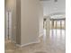 Bright hallway with tile flooring connecting different areas of the home at 36549 N Porta Nuova Rd, Scottsdale, AZ 85262