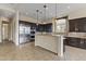 Modern kitchen with stainless steel appliances and an island at 36549 N Porta Nuova Rd, Scottsdale, AZ 85262