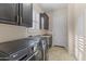 Laundry room with washer, dryer, and cabinets at 36549 N Porta Nuova Rd, Scottsdale, AZ 85262