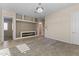Spacious living room with a modern fireplace and neutral decor at 36549 N Porta Nuova Rd, Scottsdale, AZ 85262