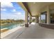 Covered patio overlooking the pool and desert landscape at 36549 N Porta Nuova Rd, Scottsdale, AZ 85262