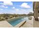 Long rectangular pool with a spa and mountain views at 36549 N Porta Nuova Rd, Scottsdale, AZ 85262