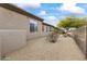 Landscaped side yard with gravel and desert plants at 36549 N Porta Nuova Rd, Scottsdale, AZ 85262