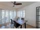 Dining area with wood table and four chairs, near sliding doors at 4226 E North Ln, Phoenix, AZ 85028