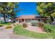 Single story home with red tile roof and landscaped yard at 4226 E North Ln, Phoenix, AZ 85028