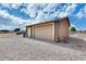 Tan colored detached garage with a single door at 43759 N Terrace View Ave, San Tan Valley, AZ 85140