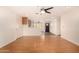 Open concept living room with kitchen and wood-look floors at 645 N Beck Ave, Chandler, AZ 85226