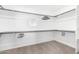 Large walk-in closet with built-in shelving and hanging rods at 6516 E Russell St, Mesa, AZ 85215