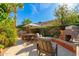 Patio with seating, dining table, and firepit at 7281 E Del Acero Dr, Scottsdale, AZ 85258