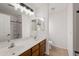 Bathroom with double vanity and large mirror at 826 E Bradstock Way, San Tan Valley, AZ 85140