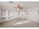 Spacious bedroom with a ceiling fan and loft area at 826 E Bradstock Way, San Tan Valley, AZ 85140
