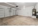 Attached garage with automatic door opener and extra storage at 826 E Bradstock Way, San Tan Valley, AZ 85140