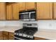 Stainless steel microwave and gas range at 826 E Bradstock Way, San Tan Valley, AZ 85140