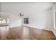 Bright living room with hardwood floors and ceiling fan at 826 E Bradstock Way, San Tan Valley, AZ 85140