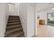 Staircase leading to the upper level of the home at 826 E Bradstock Way, San Tan Valley, AZ 85140