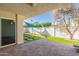 Private backyard oasis with patio, artificial turf, and shade sail at 8642 E Monterosa Ave, Scottsdale, AZ 85251