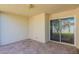 Covered patio with access to backyard and sliding glass door at 8642 E Monterosa Ave, Scottsdale, AZ 85251