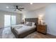 Spacious bedroom with a comfortable king-size bed and sliding door access to the backyard at 8642 E Monterosa Ave, Scottsdale, AZ 85251