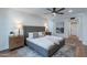 Light and airy bedroom with a king-size bed, and wood-toned nightstands at 8642 E Monterosa Ave, Scottsdale, AZ 85251