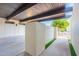 Covered carport with artificial turf and gated access at 8642 E Monterosa Ave, Scottsdale, AZ 85251