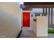Bright red front door with a modern mailbox at 8642 E Monterosa Ave, Scottsdale, AZ 85251