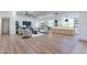Open concept living area with modern furniture and hardwood floors at 8642 E Monterosa Ave, Scottsdale, AZ 85251
