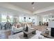 Open living room features hardwood floors, a neutral color palette, and ample natural light at 8642 E Monterosa Ave, Scottsdale, AZ 85251