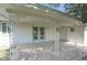 Covered patio with decorative pillars and access to backyard at 9841 N Balboa Dr, Sun City, AZ 85351