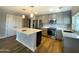 Modern kitchen with stainless steel appliances and island at 10080 E Mountain View Lake Dr # 140, Scottsdale, AZ 85258