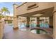 Relaxing pool and spa area with covered seating at 10080 E Mountain View Lake Dr # 140, Scottsdale, AZ 85258